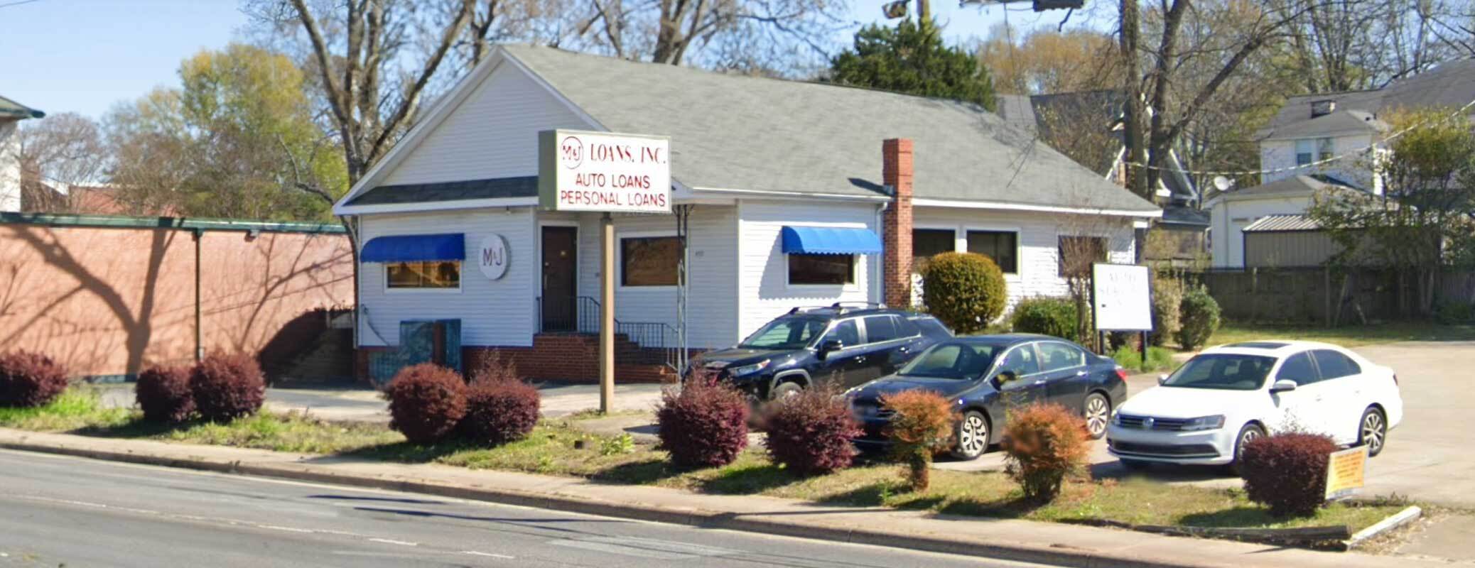 white m and j loans of shelby building with cars in parking lot in shelby north carolina white m and j loans of shelby building with cars in parking lot in shelby north carolina